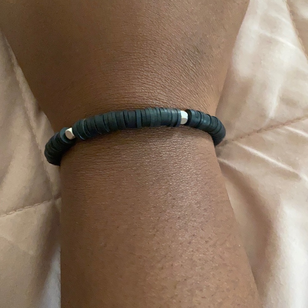 black bracelet with silver square bead
